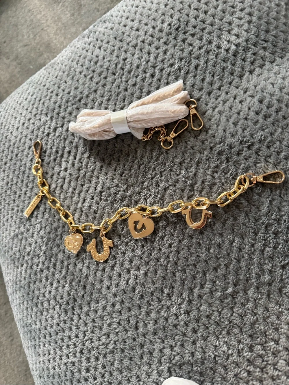 True Religion bag charm and purse handle
